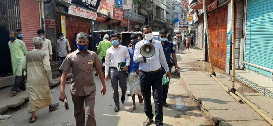 শেরপুরে লকডাউনের নির্দেশনা অমান্য করায় জরিমানা